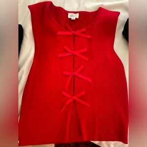 Red Sleeveless Top with Bow Accents